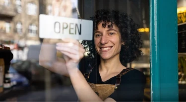 Woman opening store